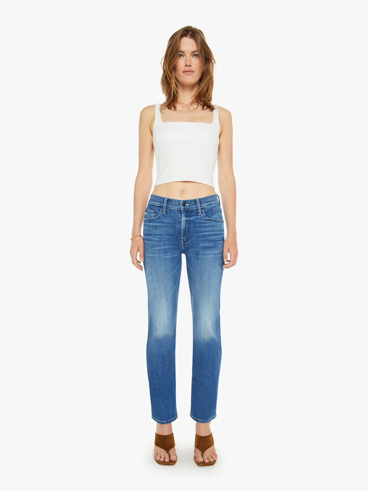 Front view of a mid-rise straight-leg jeans with an ankle-length inseam and a clean hem. 