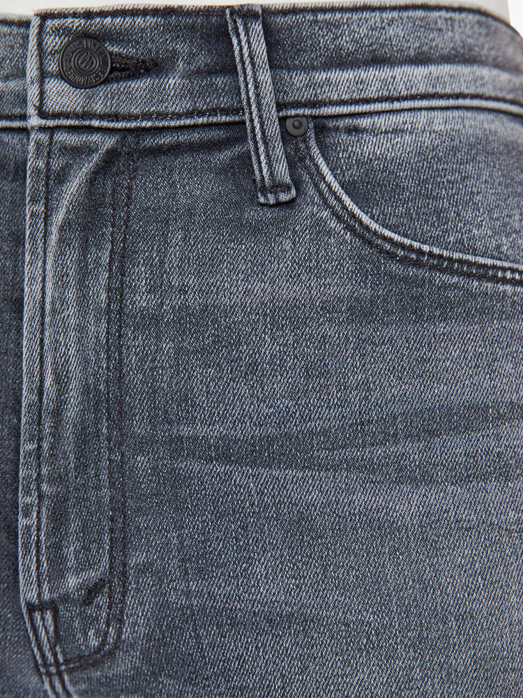 Swatch view of a womens grey wash flare jean featuring a high rise, and a long clean hem.