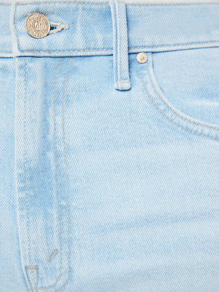 Swatch view of a woman in a light blue super wide-leg jeans with a high rise, a slouchy fit and a long 32-inch inseam.