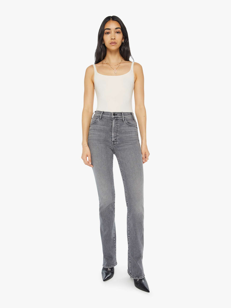 Front view of a light grey high-waisted flare jeans with a long 34-inch inseam and a clean hem.