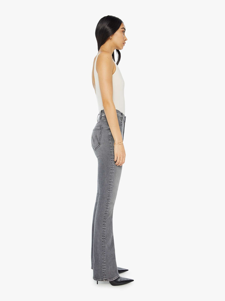 Side view of a light grey high-waisted flare jeans with a long 34-inch inseam and a clean hem.