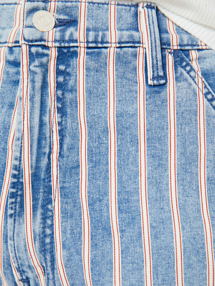 Swatch view of a woman in a super high-waisted pants with a loose, straight leg, utility-inspired patch pockets, hammer loop and a long inseam in light blue with white stripes.