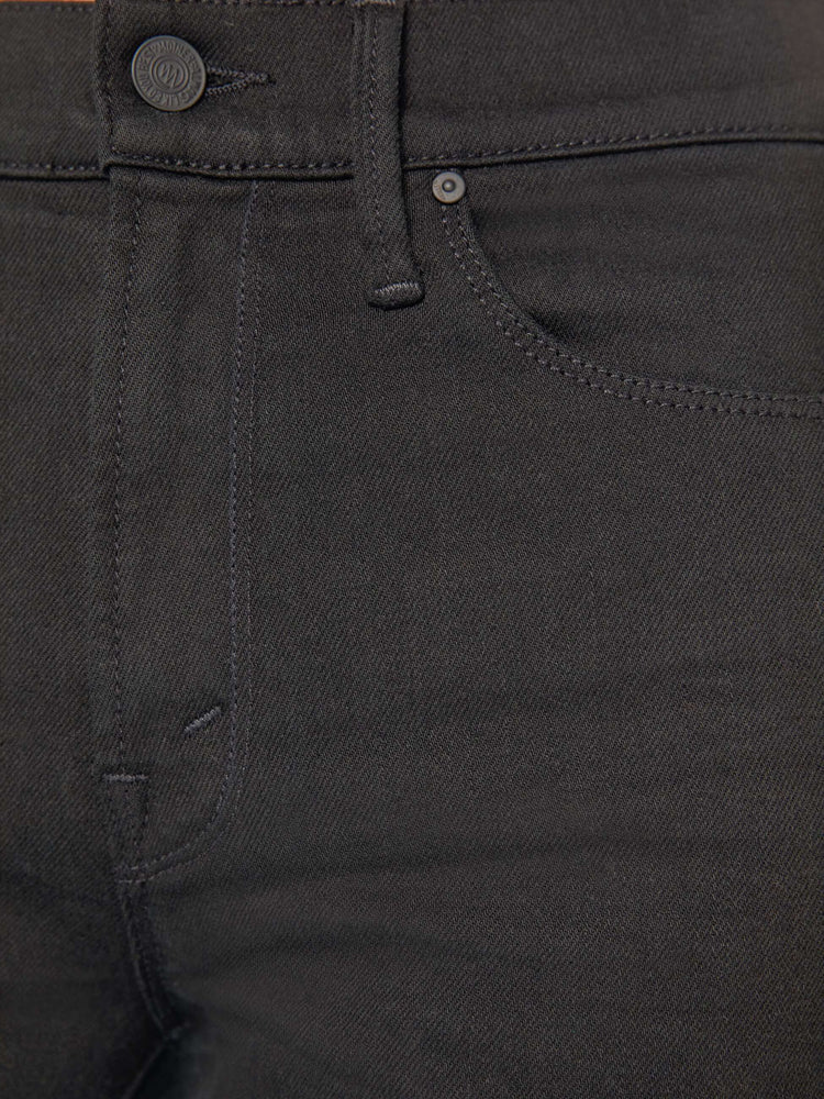 Swatch view of a woman flared, wide-leg jean with a high rise and a clean, 32-inch inseam in a solid black.