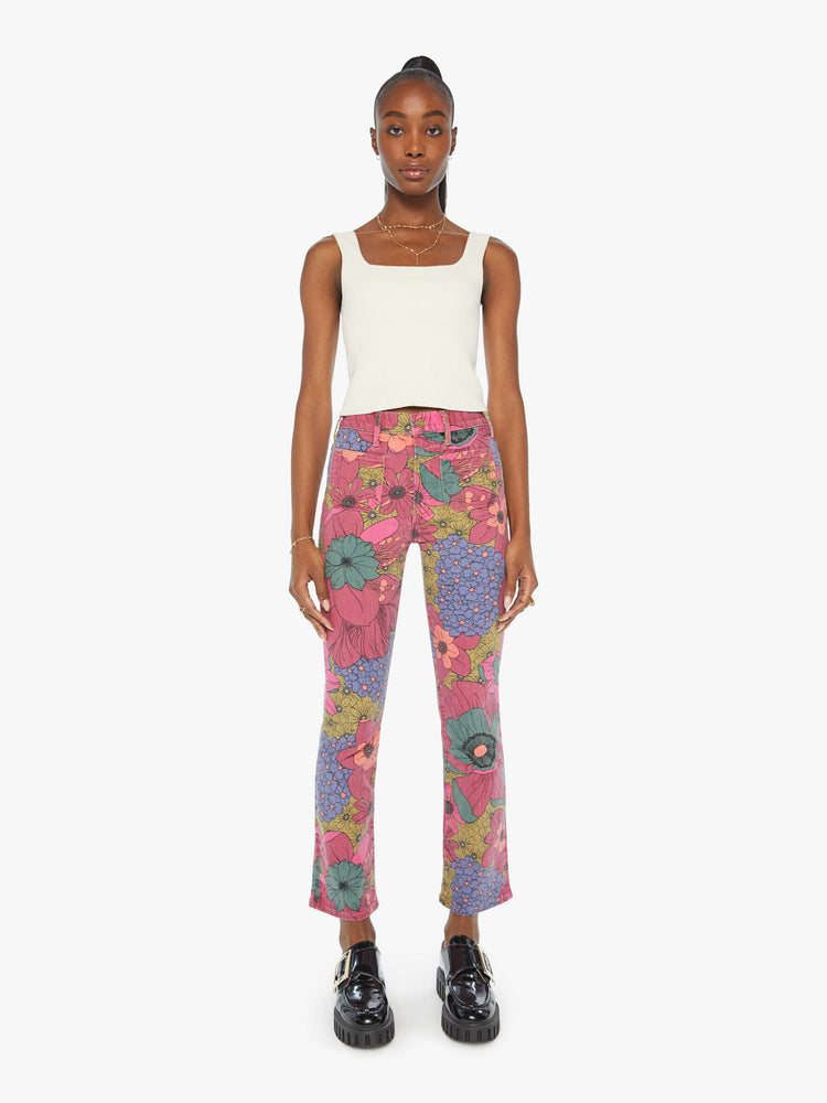 Front view of a faded floral print high-rise bootcut is designed with front patch pockets, a 28.25-inch inseam and a clean hem.