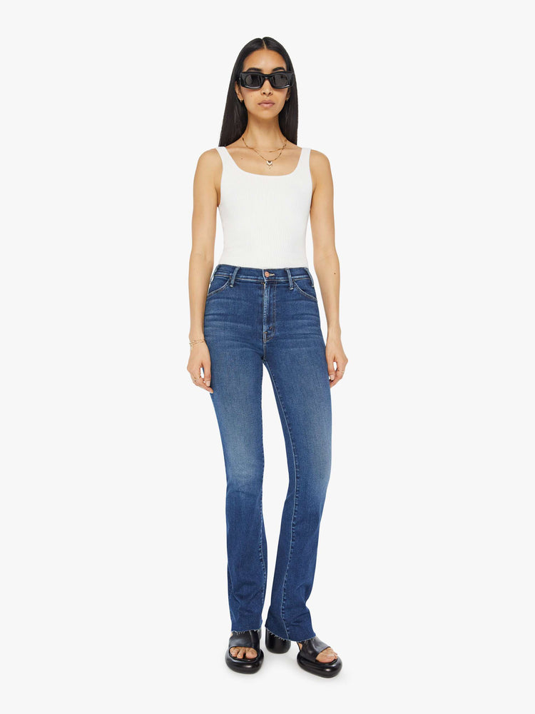 Front view of a high waisted bootcut jean in a dark blue jean.