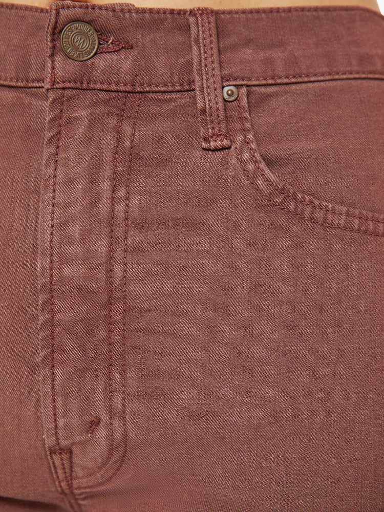 Swatch view of a woman in a brown high-waisted pants with a wide straight leg, zip fly and a long 32-inch inseam with a clean hem.