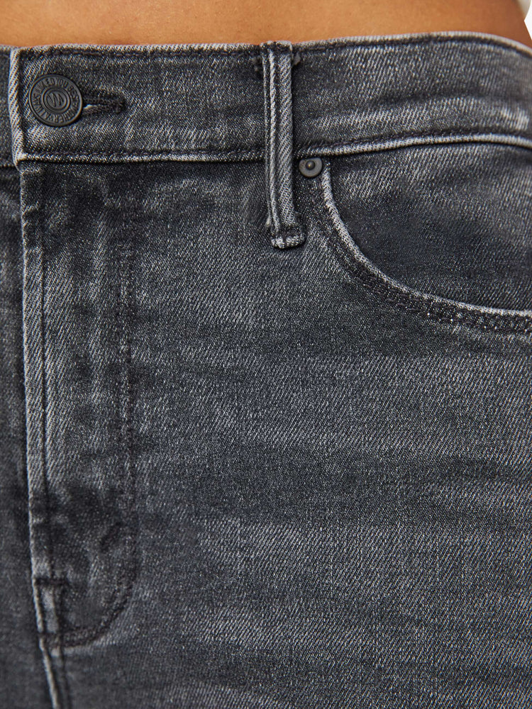 Swatch view of a woman dark grey flared, wide-leg jean with a mid rise and a clean, 34-inch inseam.