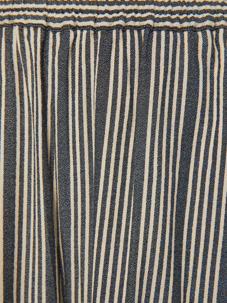 Swatch view of a woman cropped trousers with an elastic waistband, a tapered wide leg, cargo patch pockets in dark grey with a white stripe pattern.