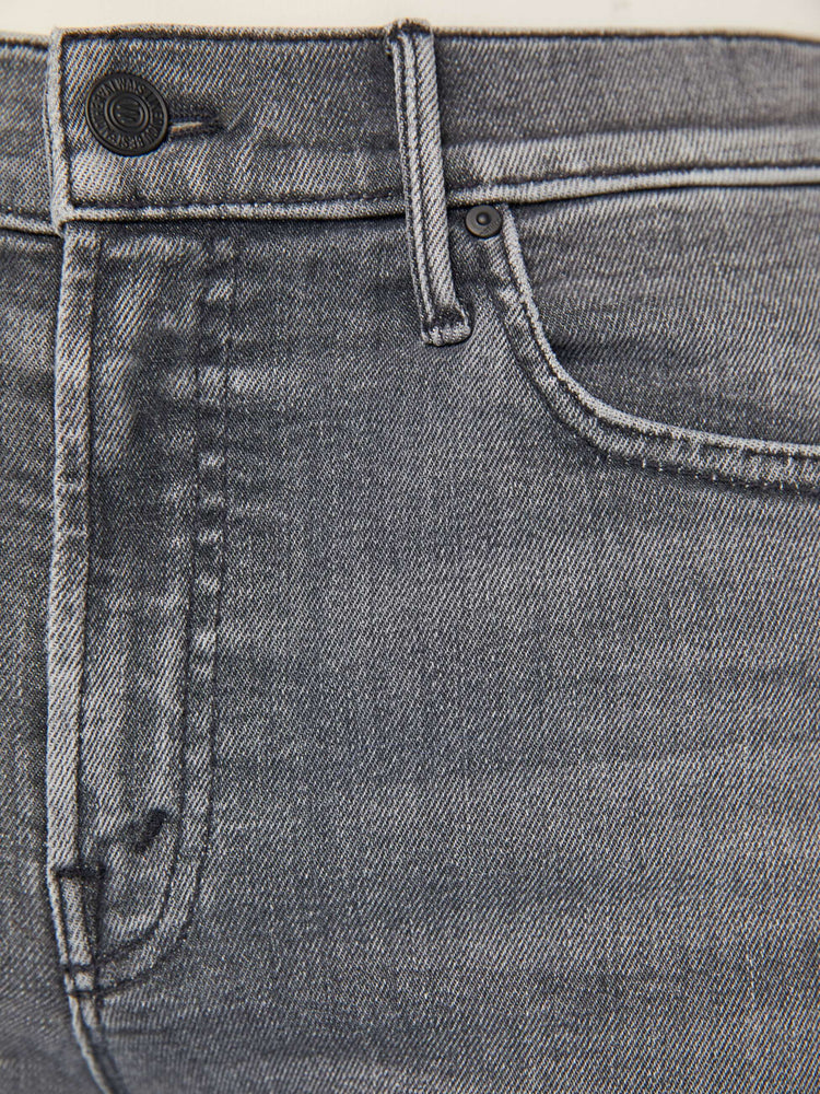 Swatch view of a grey wash mid-rise straight leg with a 28.25-inch inseam and a clean hem.