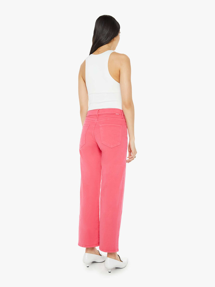 Back view of a bright pink mid-rise pants with a loose fit, wide leg and 28.25-inch inseam with a clean hem.