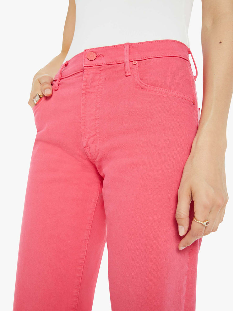 Waist view of a bright pink mid-rise pants with a loose fit, wide leg and 28.25-inch inseam with a clean hem.