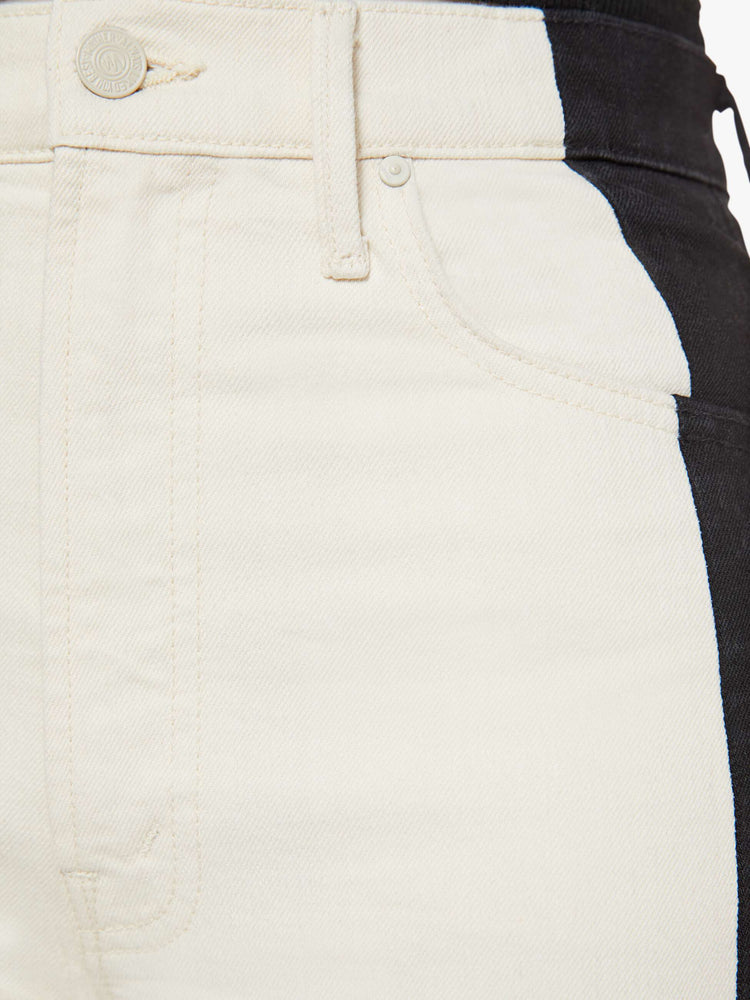 Swatch view of a woman super high-waisted pants with a loose fit, wide leg and a long 34-inch inseam with a clean hem in a cream color and a black stripe down the outer seam.