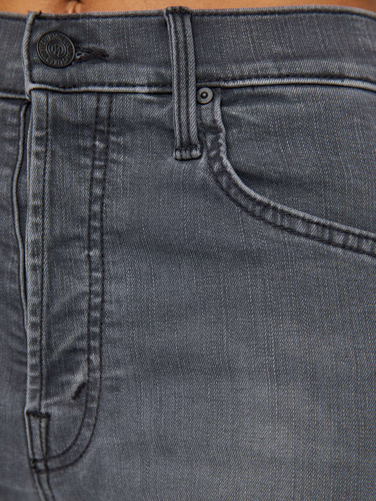 Swatched view of women's grey high waisted wide leg jean with a frayed hem