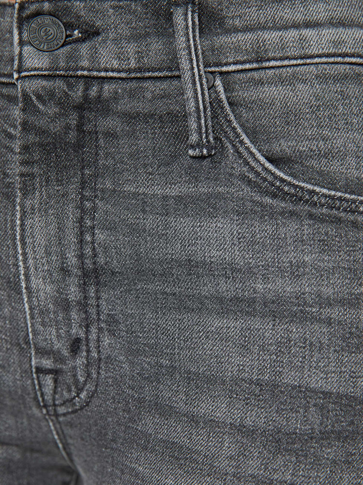 Swatch view of a dark grey flare mid rise with a 31-inch inseam and a clean hem.