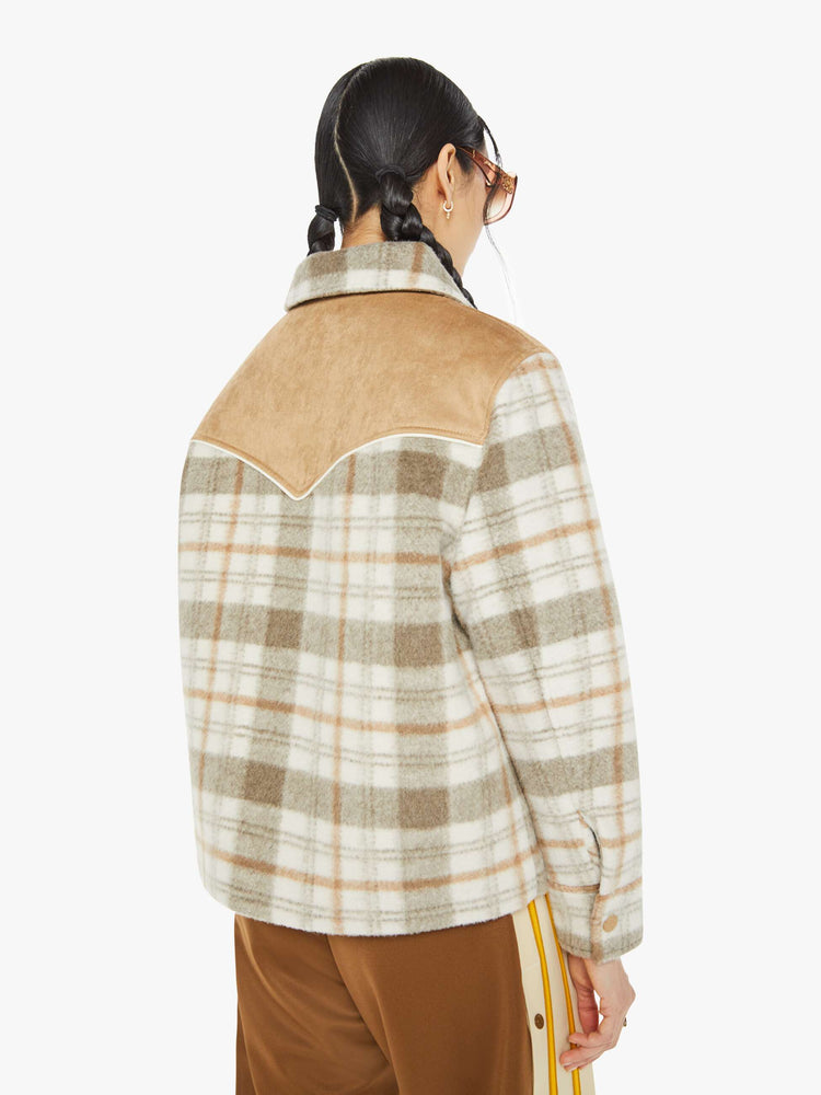 Back view of a tan plaid collared jacket with a Western-inspired yoke and snaps down the front. 