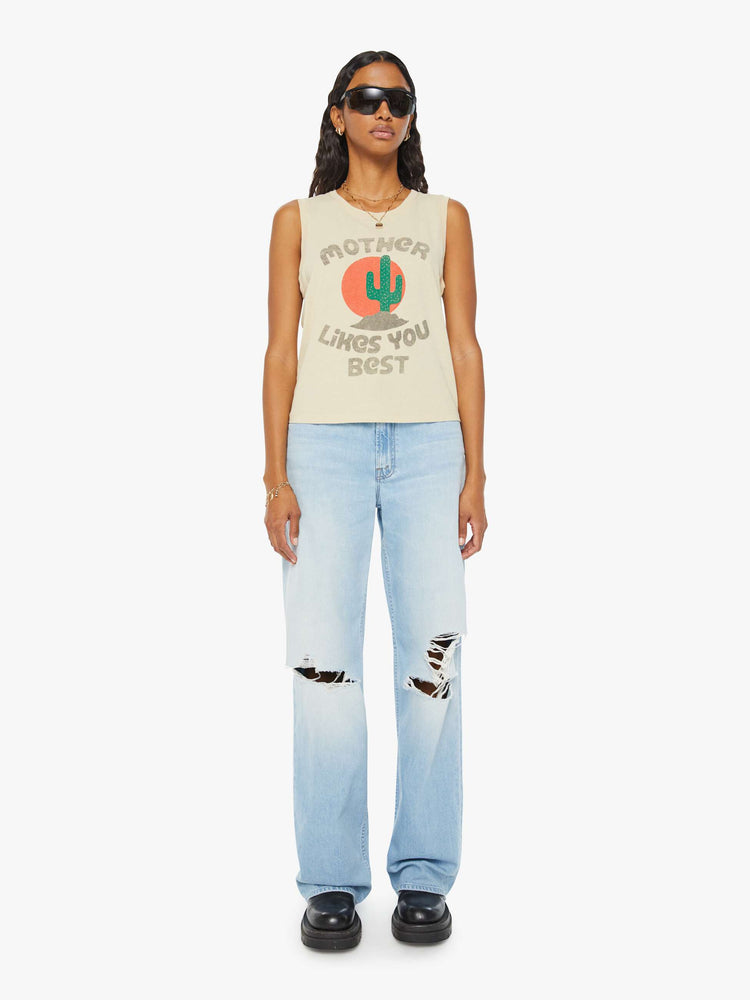 Full body view of a woman in a colorful desert cactus graphic cropped muscle tee with a crewneck and boxy fit.