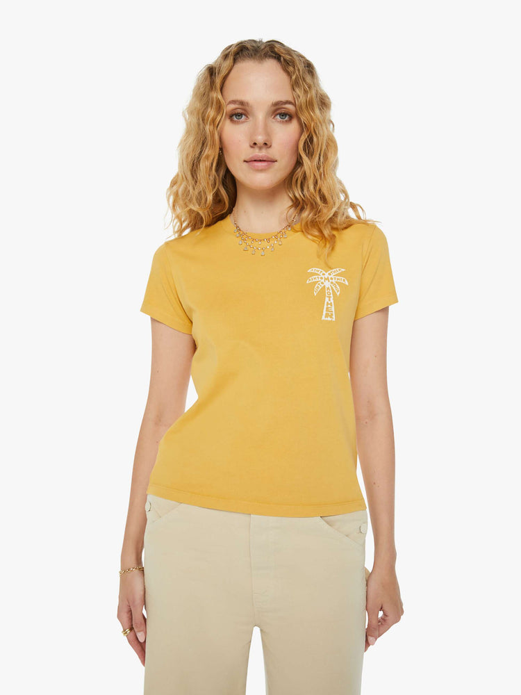 Front view of a woman in a yellow slightly sheer slim fit crewneck with a palm tree graphic and MOTHER's name on the chest and back.