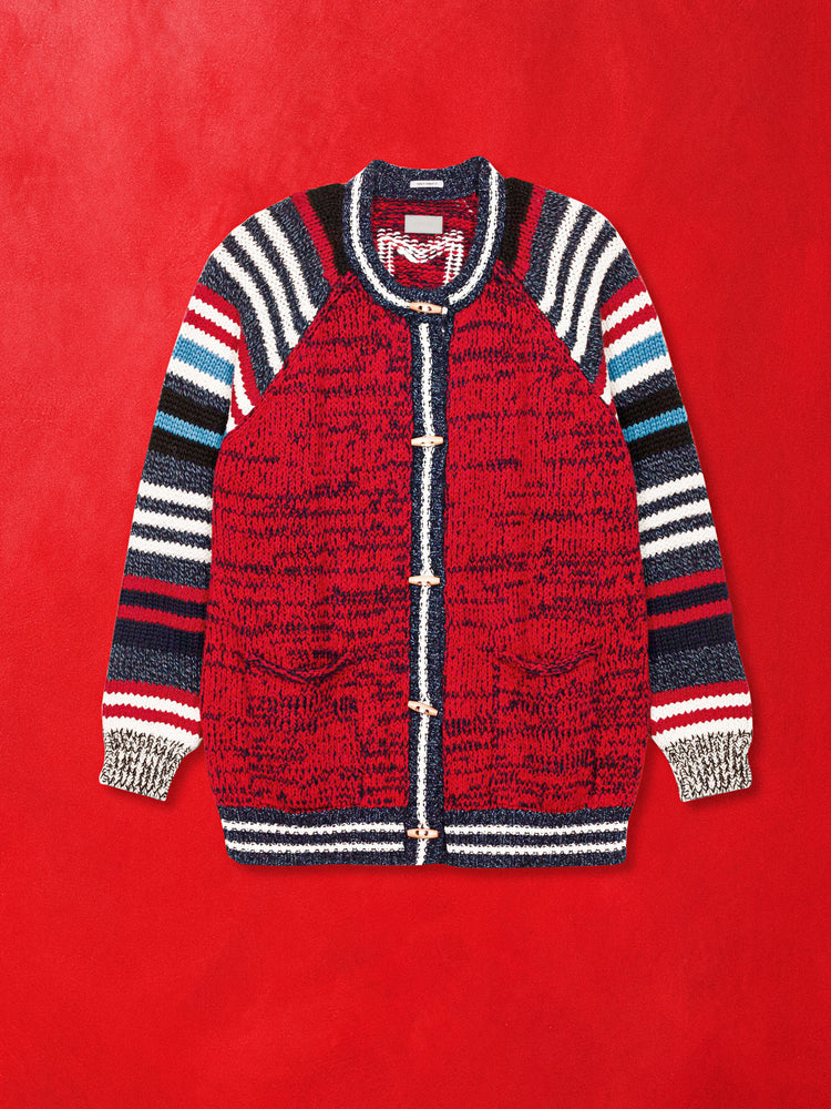 A flat product image of a red and multi stripe cardigan against a red background.