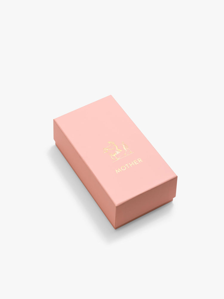 Pink box packaging for a popsicle shaped flask.