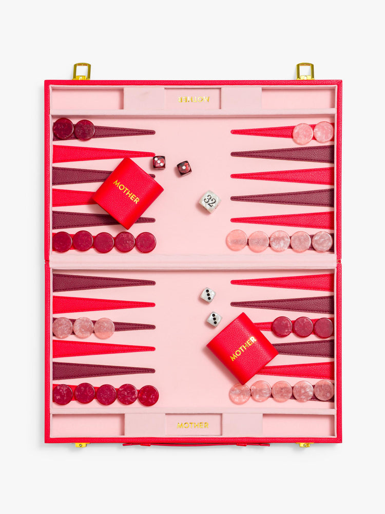 Flat view of a custom backgammon set is designed in pink, red and maroon.