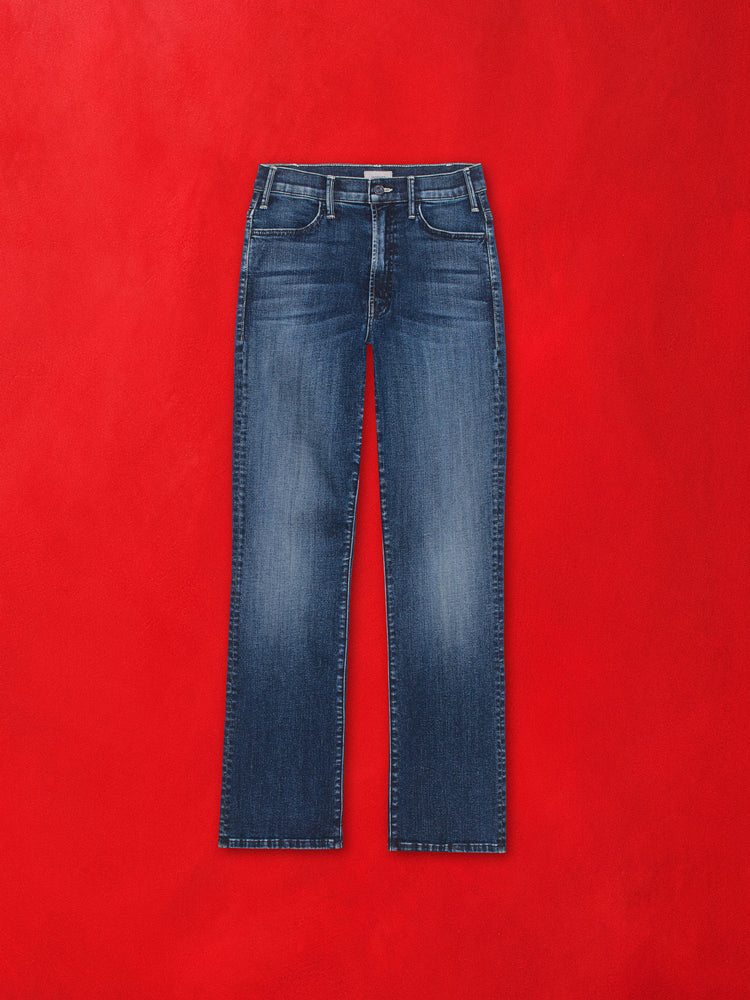 Flat image of a pair of dark blue denim bootcut jeans against a red background.