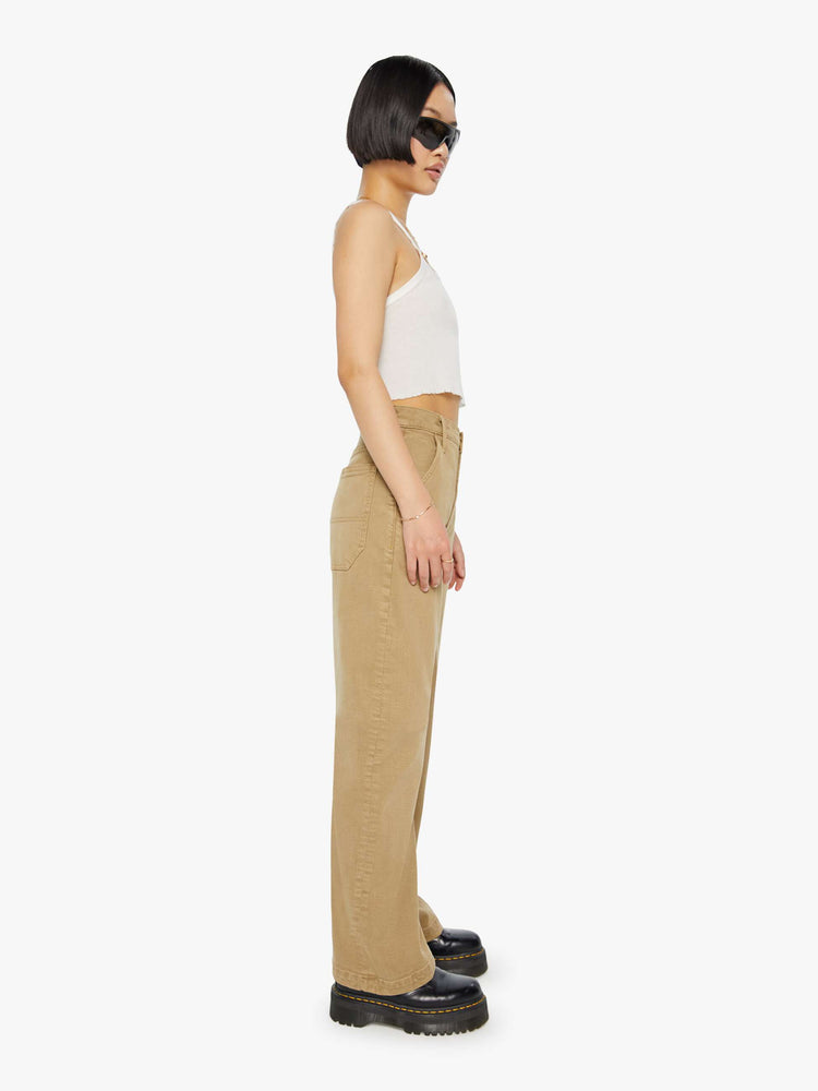 Side  view of a petite woman in a super high-waisted pants with a loose, straight leg, utility-inspired patch pockets, a hammer loop and a long 30-inch inseam with a clean hem.