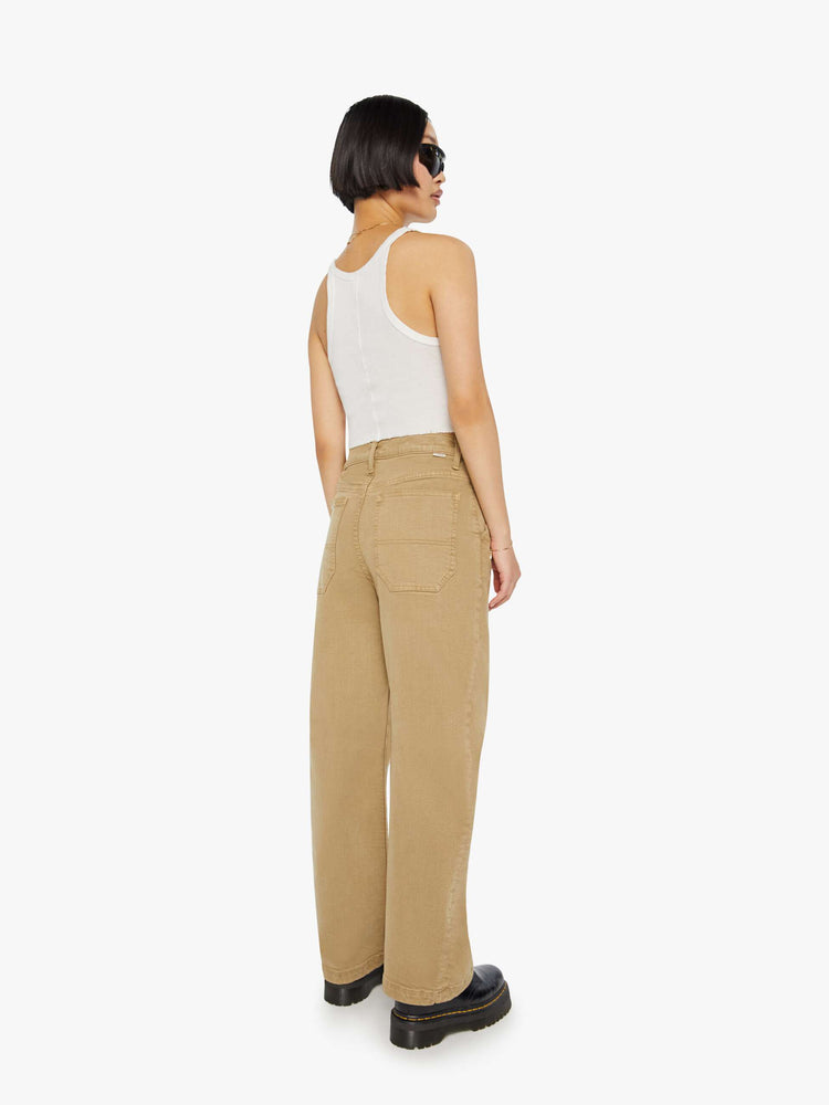 Back view of a petite woman in a super high-waisted pants with a loose, straight leg, utility-inspired patch pockets, a hammer loop and a long 30-inch inseam with a clean hem.