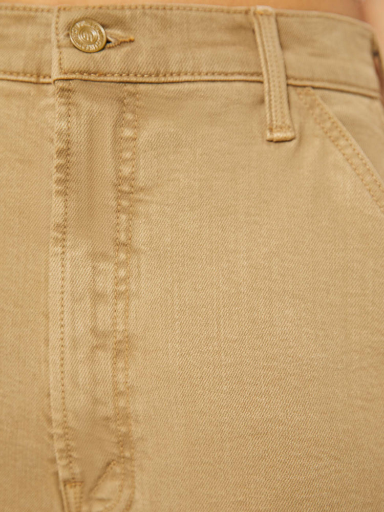 Swatch view of a petite woman in a super high-waisted pants with a loose, straight leg, utility-inspired patch pockets, a hammer loop and a long 30-inch inseam with a clean hem.