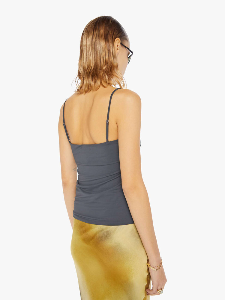 Back view of a charcoal grey sleeveless top with a shallow V-neck, thin spaghetti straps, a gathered seam down the front and a narrow fit.