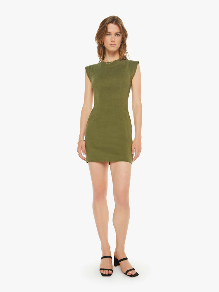 Front view of a woman in a olive green sleeveless mini dress with a crewneck, narrow fit and thigh-grazing hem.