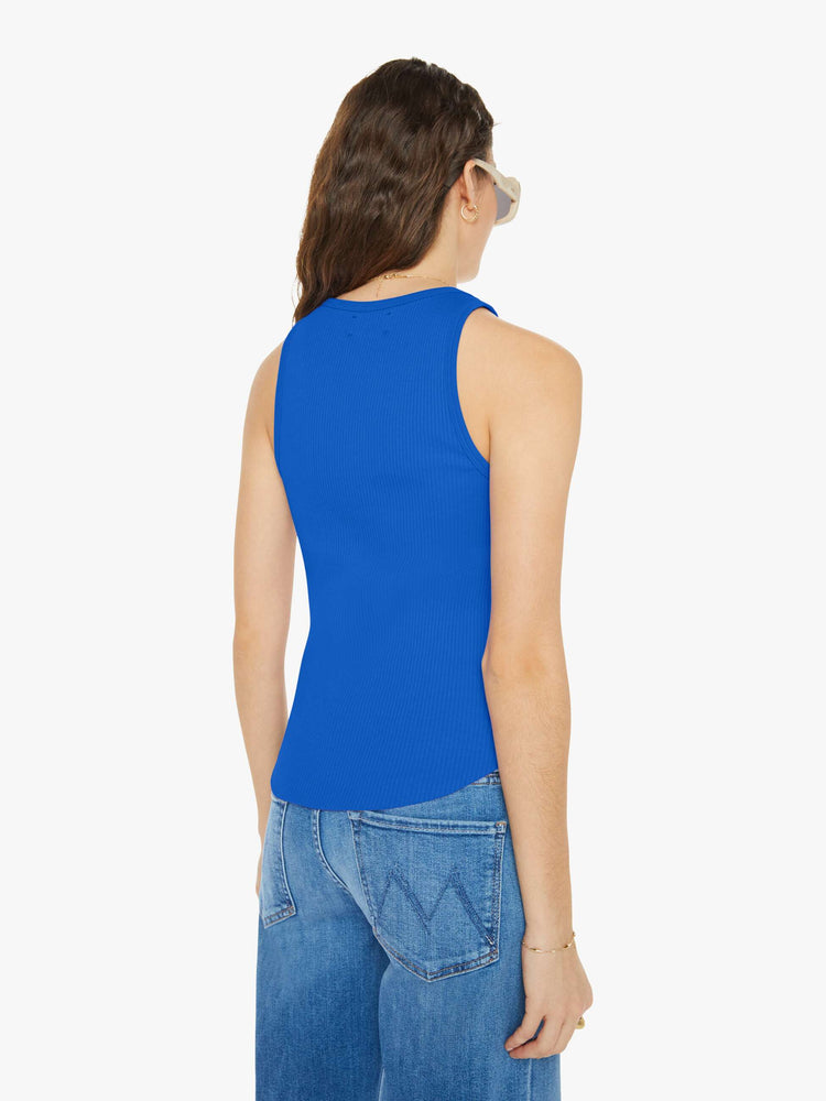 Back view of a woman in a blue tank top with a scoop neck, slim fit and hip-grazing hem.