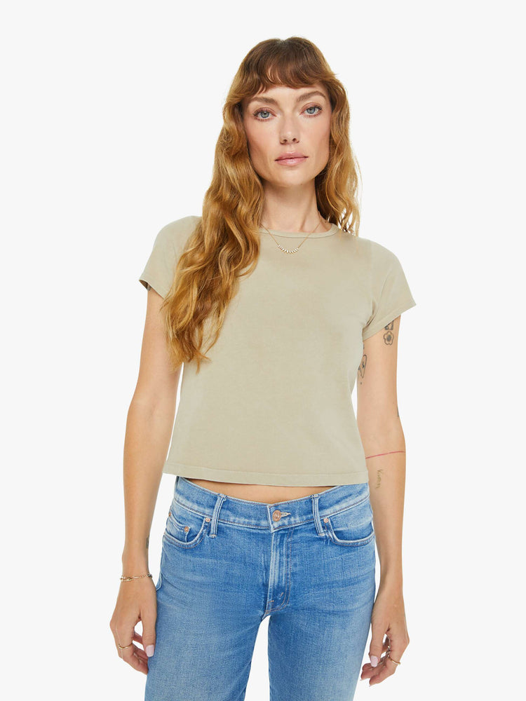 Front view of a woman in taupe tee with a cropped hem and shrunken fit.