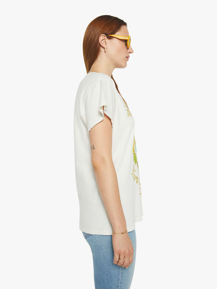 Side view of a white crew neck tee featuring a Willie Nelson graphic.