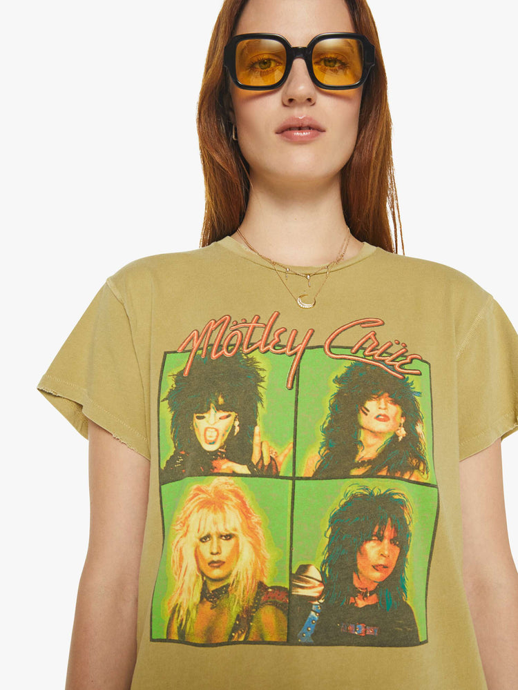 Front close up view of a faded green crew neck tee featuring a Motley Crue graphic.