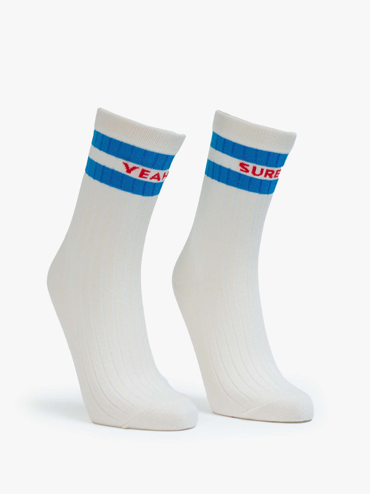 Front view of a tube socks with a message from MOTHER. Shown here in cream with red text and blue details.